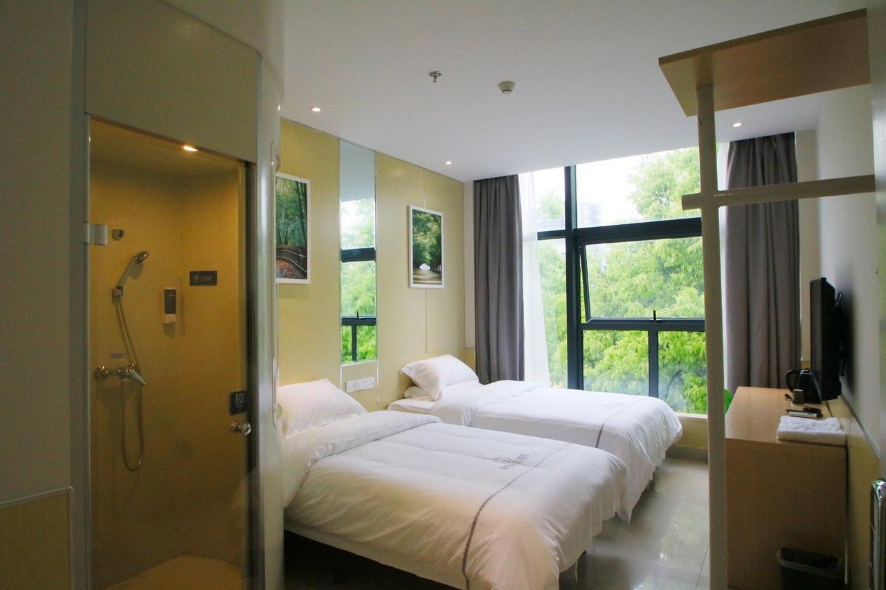 100 Inn Plus Pudong Airport Hotel Шанхай Экстерьер фото